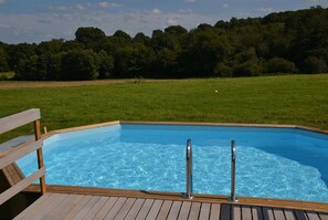 Seasonal outdoor pool, pool umbrellas, pool loungers