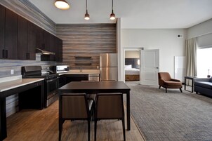 Premium bedding, desk, blackout drapes, iron/ironing board