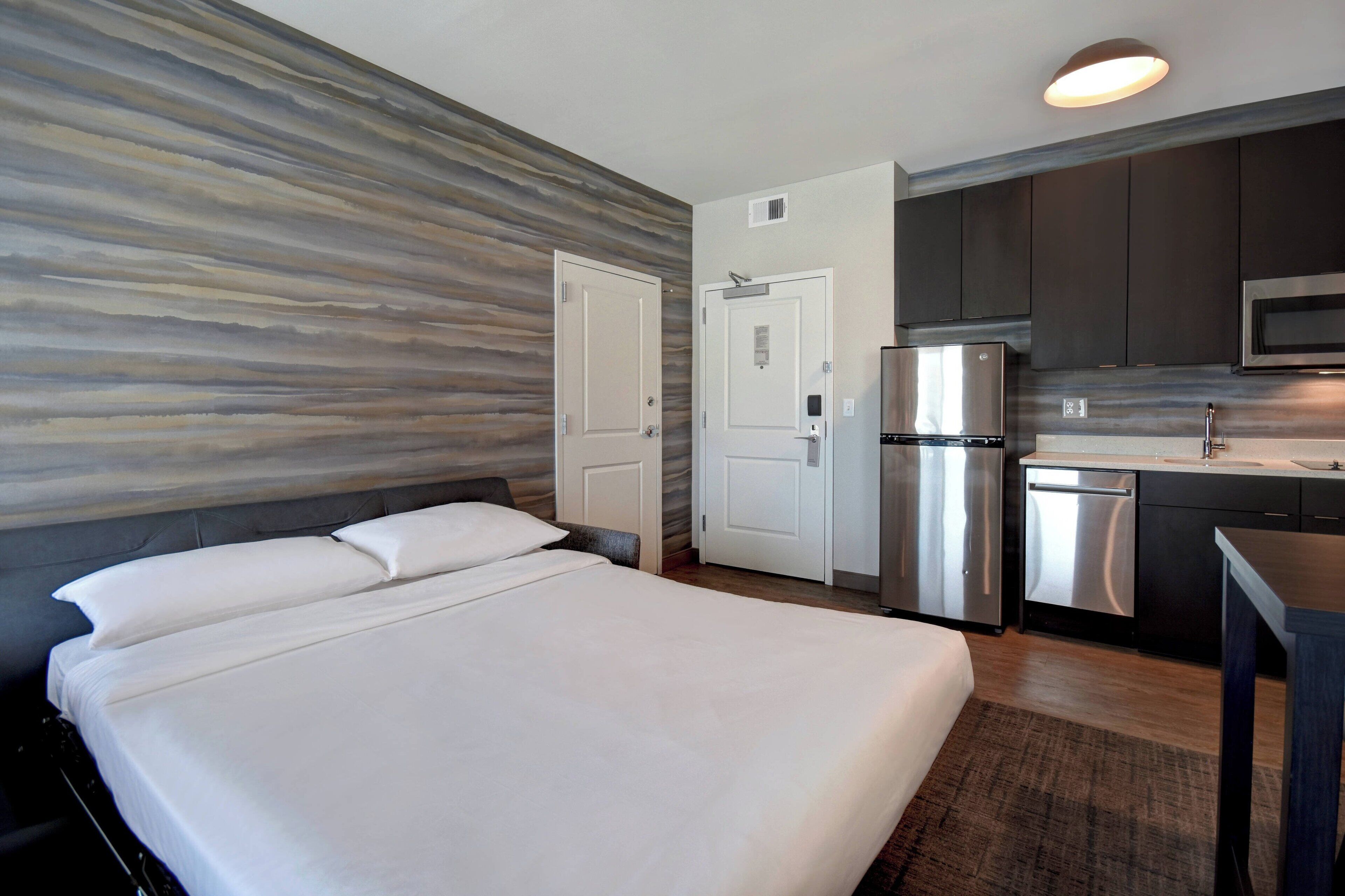 studio, 1 king bed with sofa bed | premium bedding, desk, blackout curtains, iron/ironing board