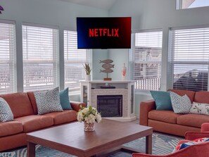 Smart TV, fireplace, video games, DVD player