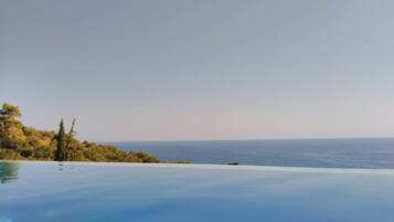 Seasonal outdoor pool, sun loungers