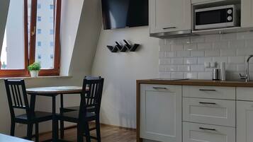 Apartment (A) | Living area | Flat-screen TV