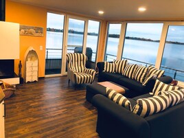 Houseboat | Living area | Flat-screen TV, fireplace, DVD player
