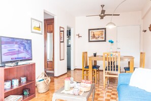 Apartment, 1 Bedroom | Living area | Flat-screen TV