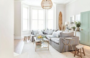 TV, fireplace, books