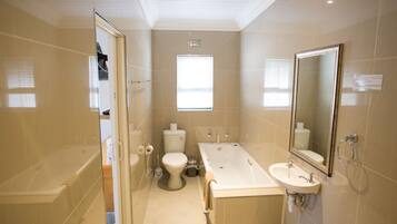 Family Room, 1 Bedroom | Bathroom | Separate bathtub and shower, hair dryer, towels, soap