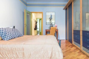 Apartment, 1 Bedroom, Balcony | 1 bedroom, desk, laptop workspace, iron/ironing board - JOIVY Cozy Flat for 4 w/ Patio, Nearby Navigli (Milan)