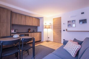 Appartement, 1 chambre | Coin séjour