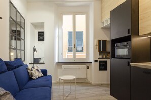 อพาร์ทเมนท์, 1 ห้องนอน | บริเวณนั่งเล่น | ทีวี 40 นิ้ว พร้อมช่องเคเบิล