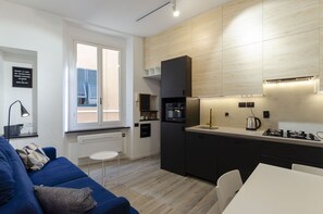 อพาร์ทเมนท์, 1 ห้องนอน | บริเวณนั่งเล่น | ทีวี 40 นิ้ว พร้อมช่องเคเบิล