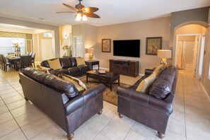 House (7 Bedrooms, 6 Bathrooms) | Living area | 60-inch LCD TV with cable channels, TV, DVD player