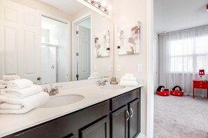 Bathtub, towels, toilet paper