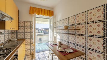 Apartment, 1 Bedroom | Private kitchen | Full-size fridge, microwave, oven, coffee/tea maker