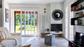 Villa, 3 Bedrooms, 2 Bathrooms | Living area | 32-inch flat-screen TV with satellite channels, TV, fireplace