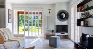 Villa, 3 Bedrooms, 2 Bathrooms | Living area | 32-inch flat-screen TV with satellite channels, TV, fireplace - JOIVY MAS Avilo Villa Bobbio (Bobbio)