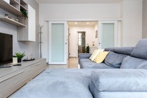 Apartment, 2 Bedrooms, Balcony | Living room | 27-inch TV with digital channels