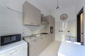 Appartamento, 2 camere da letto | Cucina privata | Frigorifero, microonde, forno, piano cottura