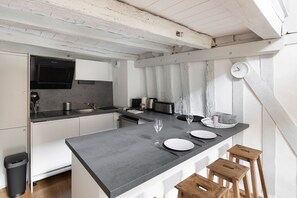 Fridge, microwave, coffee/tea maker, toaster