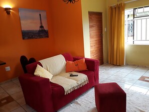 Living area - A house right next to the main highway, easy excess to town and the border. (Mbabane)