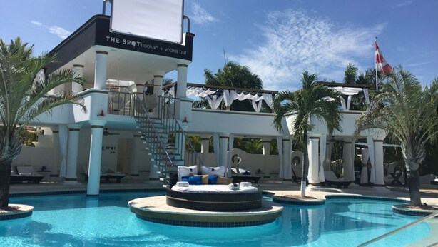 A hotel with a pool area, a hot tub, and a bar named "The Spot." - BEAUTIFUL 3-4 BEDROOM VILLA, PRIVATE POOL, V.I.P. ACCESS $200 per night (Puerto Plata)