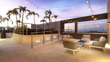 Outdoor pool, open 8:00 AM to 8:00 PM, pool umbrellas, sun loungers