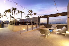 Outdoor pool, open 8:00 AM to 8:00 PM, pool umbrellas, pool loungers