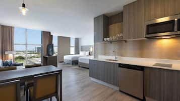 Studio, 2 Queen Beds, Non Smoking, City View | Private kitchen | Full-size fridge, microwave, stovetop, dishwasher