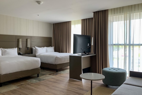 In-room safe, laptop workspace, blackout drapes, soundproofing