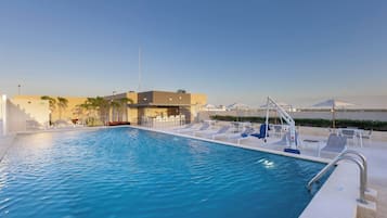 Outdoor pool, open 8:00 AM to 8:00 PM, pool umbrellas, sun loungers