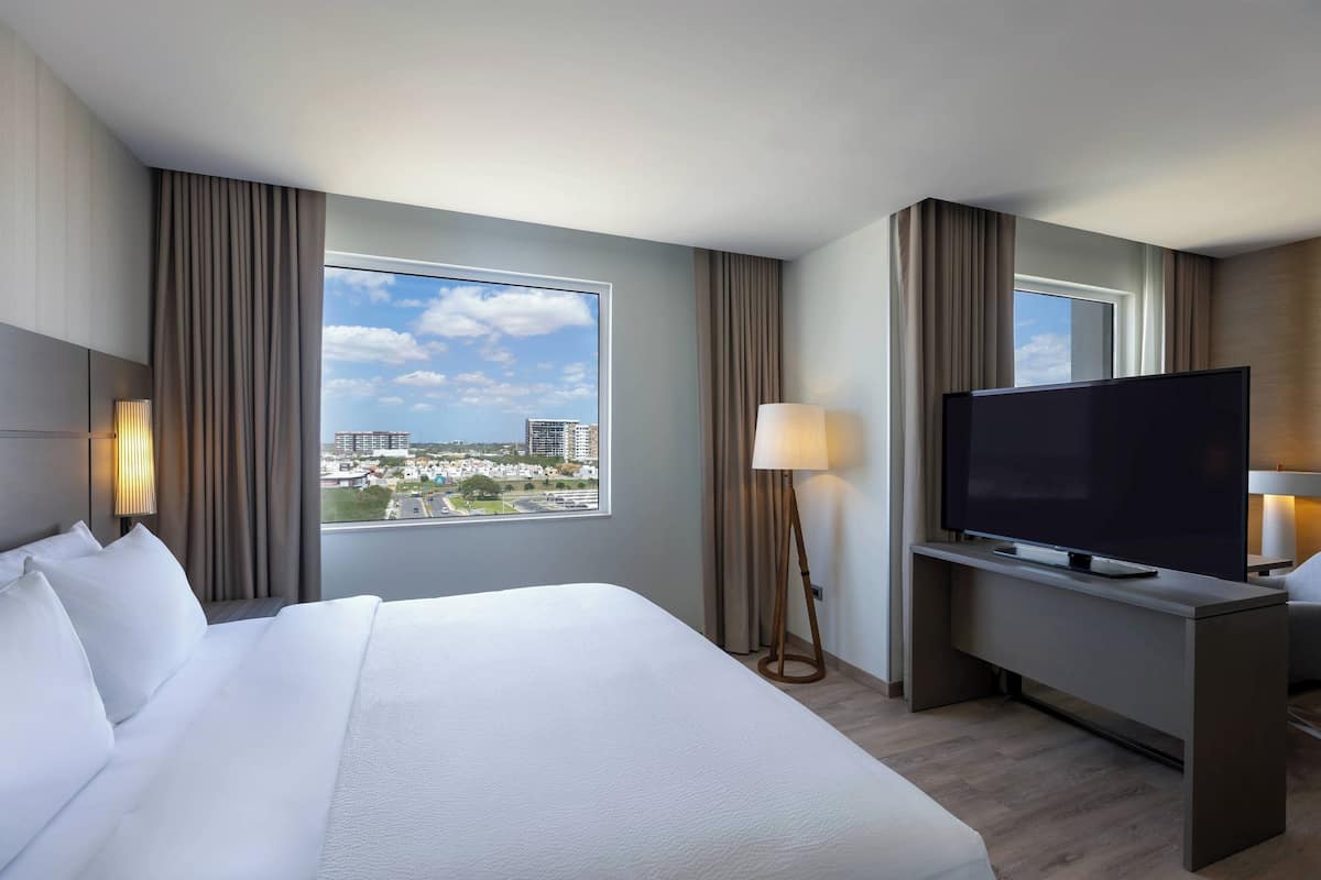 In-room safe, laptop workspace, blackout drapes, soundproofing