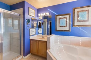 Separate bathtub and shower, hair dryer, towels, soap - Mickeys Maingate Mansion by VillaDirect (Kissimmee)
