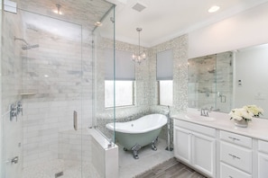 Combined shower/tub, hair dryer, towels, soap