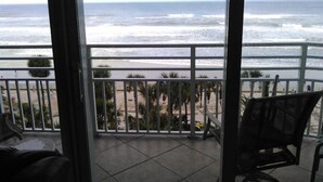 A balcony with a view of the beach and ocean. - Ocean Walk Resort  603 Spectacular View (Daytona Beach)