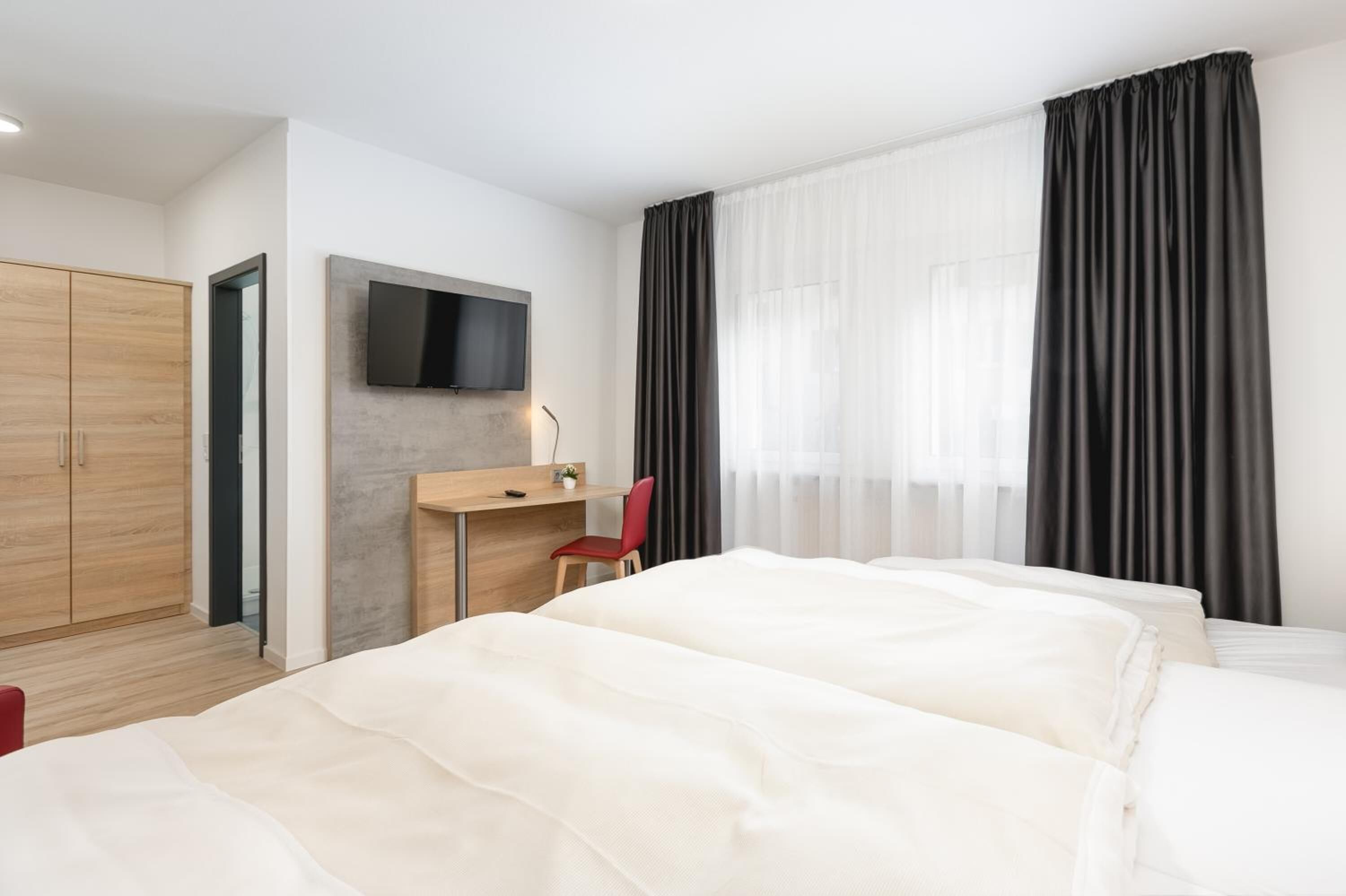 Desk, cots/infant beds, rollaway beds, free WiFi