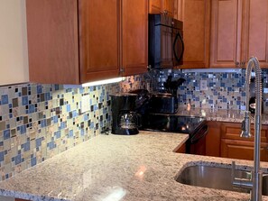 Fridge, oven, dishwasher, coffee/tea maker