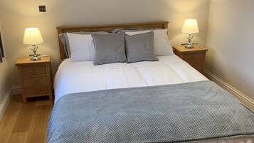 3 bedrooms, memory-foam beds, iron/ironing board, travel cot