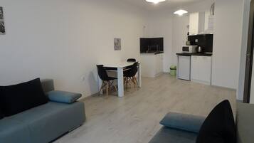 Apartment | Desk, laptop workspace, blackout drapes, soundproofing