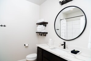 Shower, free toiletries, hair dryer, towels