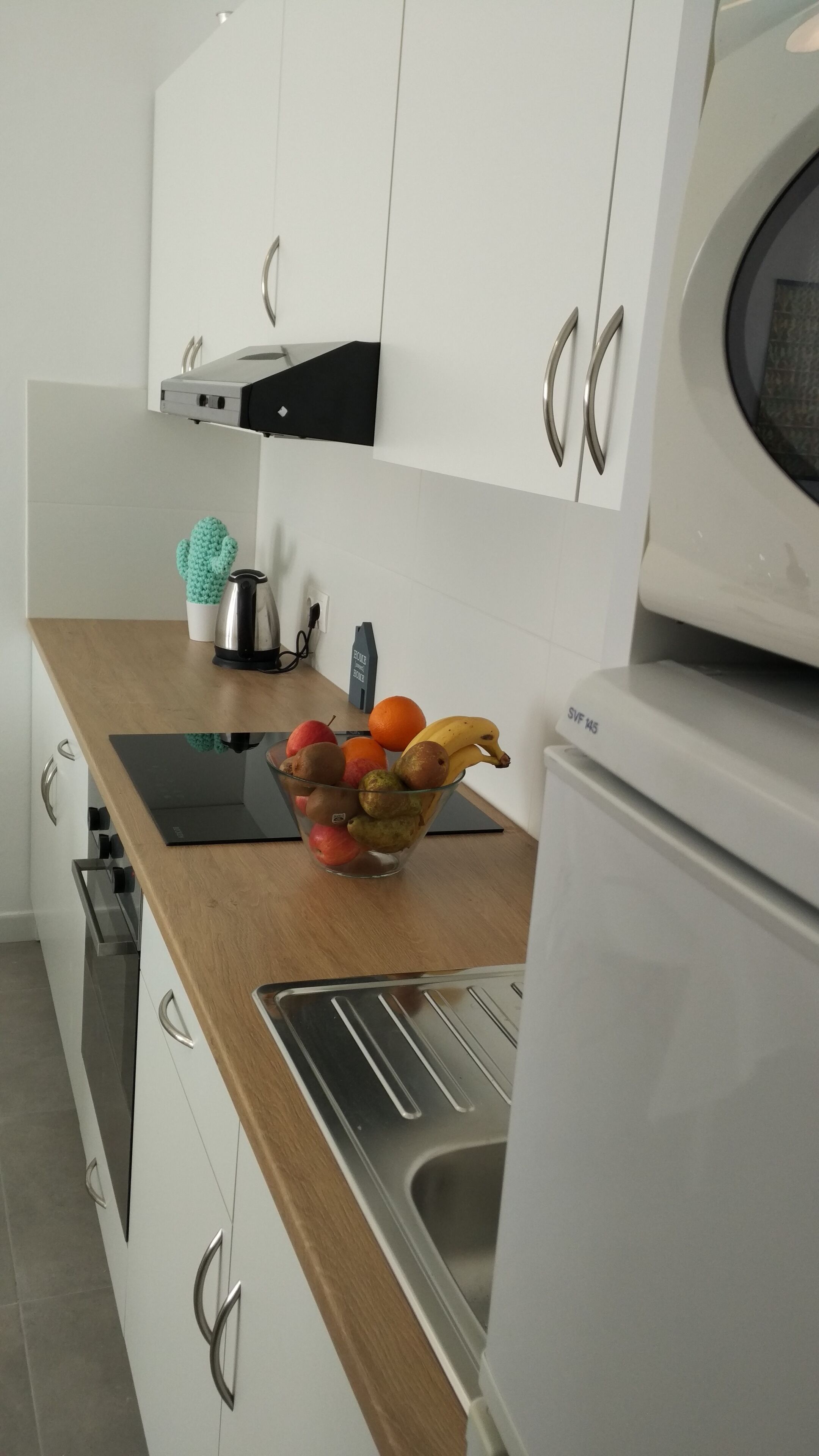 Fridge, microwave, oven, cookware/dishes/utensils