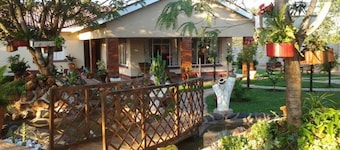 Flatlet palmiers et rosiers