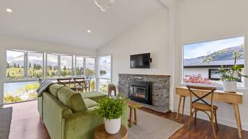 The Tekapo Suite | Living area | 42-inch Smart TV with digital channels, TV, iPod dock