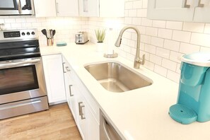 Dishwasher, toaster, cookware/dishes/utensils