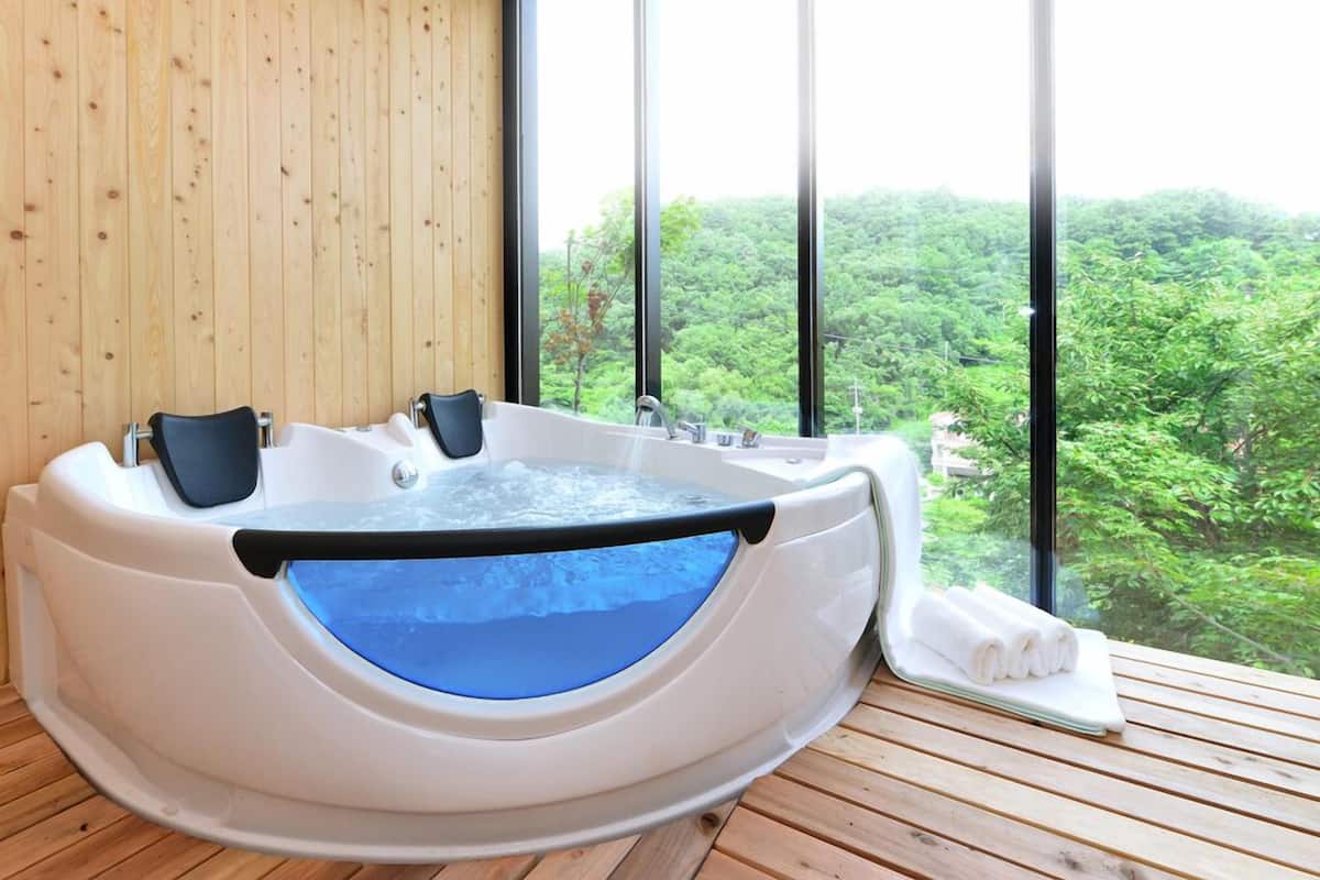 Chambre (202) | Baignoire à hydromassage