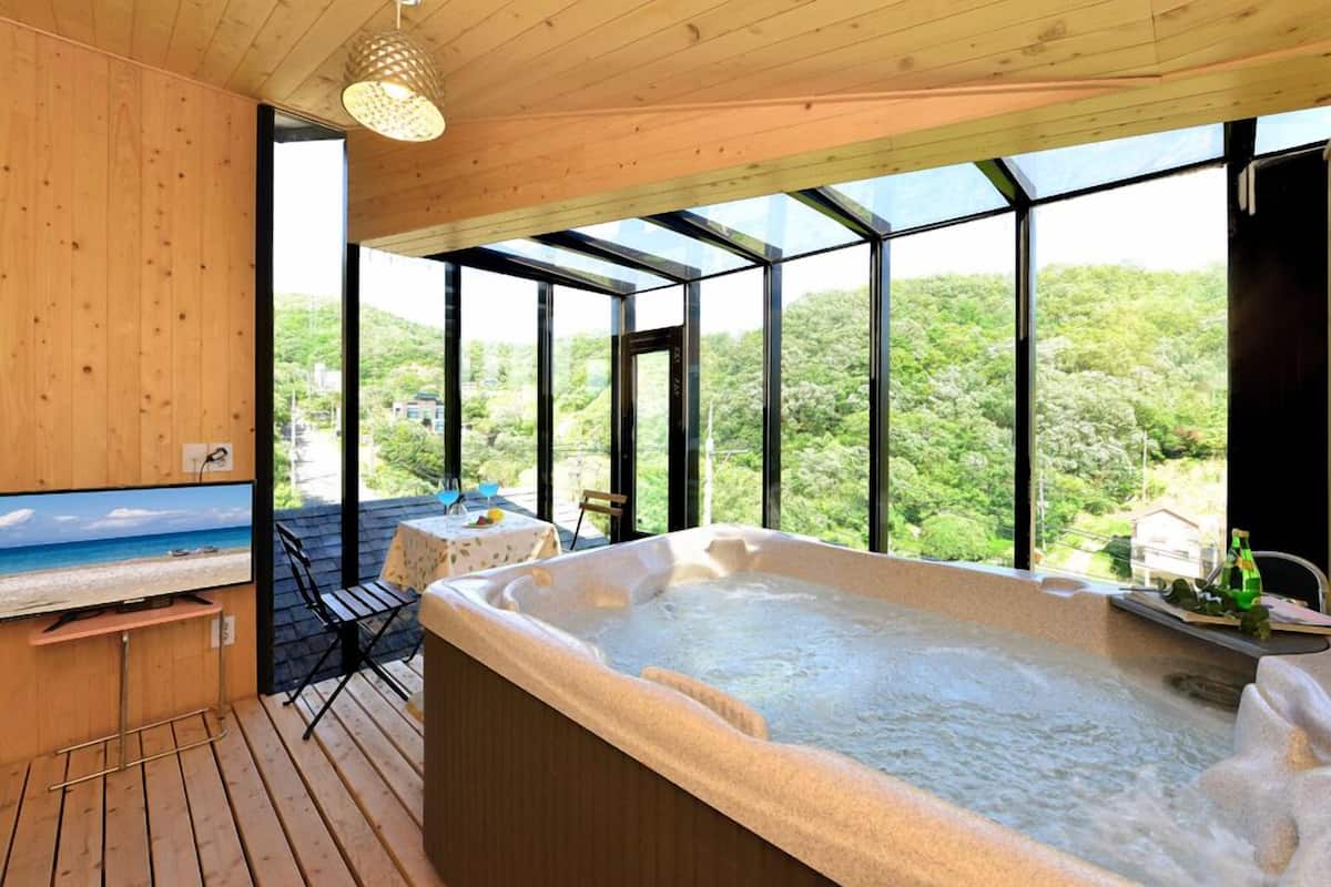 Chambre (301) | Baignoire à hydromassage
