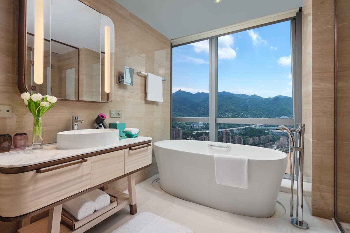 rainfall showerhead, designer toiletries, hair dryer, bathrobes