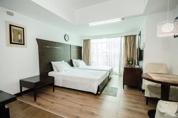 Deluxe Quadruple Room | Free WiFi, bed sheets