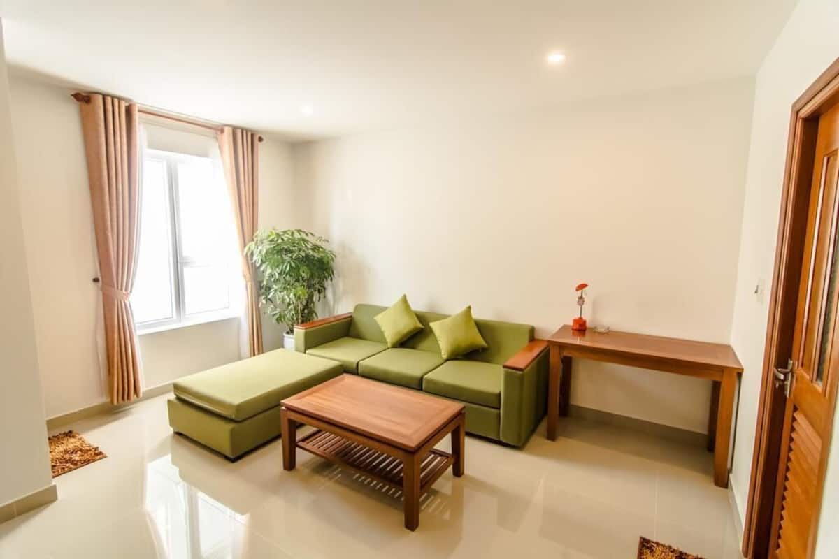 Basic Quadruple Room | Living room