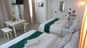 Twin Room, 2 Queen Beds | Free WiFi, bed sheets - Cronin Inn by Cocotel (Oslob)