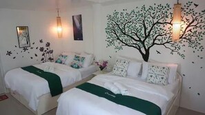Twin Room, 2 Queen Beds | Free WiFi, bed sheets - Cronin Inn by Cocotel (Oslob)