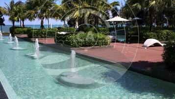 3 outdoor pools, open 7:00 AM to 10:00 PM, pool umbrellas, sun loungers